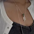 Detailed close-up of a silver necklace with a grape cluster water drop pendant design. - Dalmatian Hoop Style (XL2227) / Tassel Grape Cluster Adjustable Bead Chain