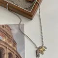 Trendige Halskette mit silberner Kugelkette und goldenem Pferdeanhänger und Fransen - Kugelkette / Silberschwanz Goldpferd