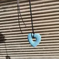 Large light blue heart-shaped lava stone pendant necklace with adjustable black cord strap - Hollow Big Heart / Light Blue