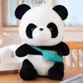 Adorable soft panda plush toy wearing a teal green satchel with China embroidery detail - Backpack Panda / 25cm