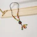 Exquisite handgefertigte bunte Keramikperlenkette im Vintage-Ethno-Stil für Damenmode - Bunte Perlen Holzring Quaste
