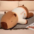 Long sleeping Capybara plush body pillow wearing a cute orange shirt home decor - Orange / 75cm