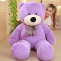 Giant purple teddy bear plush toy with a classic plaid bow tie for a birthday gift - Purple