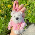 Cute white plush Westie dog keychain wearing a pink knitted sweater for bag decoration. - Pink