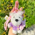 Cute white Westie dog plush keychain wearing a purple sweater and pink rabbit doll - Purple