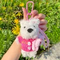 Cute plush Westie dog keychain wearing a pink knitted sweater with yellow heart pattern - Rose Red