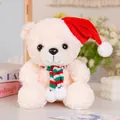 Weicher cremefarbener Plüsch-Teddybär mit roter Weihnachtsmannmütze und Streifenschal - Cremeweiß (Weihnachtsstil) / 25cm