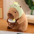 Peluche de carpincho adorable con capucha de dinosaurio verde y taza de té - Dinosaurio / 30cm