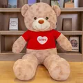 Giant teddy bear plush toy wearing a red sweater with a white love heart design - Light Brown Red Hoodie