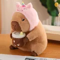 Peluche de Carpincho con sombrero de unicornio rosa sosteniendo una tacita café. - Diseño de Unicornio