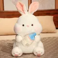 Cute white plush bunny doll holding a blue baby bottle, soft stuffed animal toy - White / 35cm