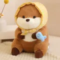 Adorable capybara plushie wearing a yellow checkered hat and holding a blue fish toy - Headband Capybara With Blue Fish / Brown / 30cm