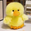 Adorable fluffy yellow duck plush toy featuring soft long fur and an orange beak - Yellow / 25cm