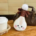 Soft plush pipa musical instrument toy featuring a cute smiley face and white pom-pom - 20cm / Pipa Instrument