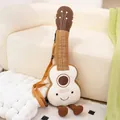 Cozy cartoon guitar plush toy pillow with a cute smiling face and carrying strap - 20cm / Guitar Style