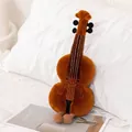 Adorable violin-shaped plush toy with a smiling face resting on a soft white pillow - 38 cm / Violin