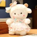 Adorable white soft plush lamb doll with a pink patterned lace dress and bow - White Cake Layered Dress