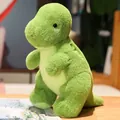 Lindo dinosaurio de peluche verde T-Rex para niños sobre una superficie de madera - T-Rex / 28cm