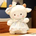 Cute soft white sheep plush doll wearing a floral dress and a matching head bow. - Blue Rabbit Print Dress