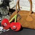 Ciondolo per borsa a ciliegia in peluche con faccine su borsa marrone - Stile Portachiavi / Ciliegia / 10-15cm