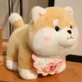 Adorable Shiba Inu dog plush toy wearing a soft pink knitted bib with pig detail - Pig Style