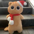 Large orange plush cat toy with Christmas Santa hat and red scarf decoration - Yellow Cat Christmas Edition