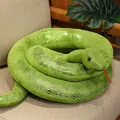 Realistic green plush snake toy with shimmering scale texture for prank and home decor. - Cyan