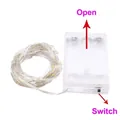 Detailed view of the LED copper wire string light battery box with switch and open guide - Battery Box (Warm White)
