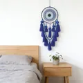 Blue evil eye dreamcatcher wall hanging with tassels and wooden beads in bedroom. - Dark Blue Evil Eye Style (MS0118E) / 20x65cm