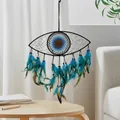 Handcrafted blue Evil Eye dreamcatcher with feathers and beads for wall hanging decor. - Black (MS9231A)