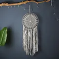 Elegant handmade Nordic crochet dreamcatcher wall hanging featuring soft white feathers - Radial Geometric Pattern (MS9266) / MS9266