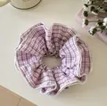 Detail view of the pink plaid fabric texture on a soft elastic hair scrunchie - Purple Stripe Double Layer Scrunchie / Pink Purple