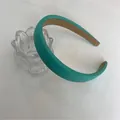 Vista dettagliata del cerchietto imbottito in spugna verde acqua da 2 cm con tessuto - 3# Verde Crema