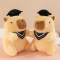 Detailed view of two cute graduation capybara plush toys wearing caps and scarves - Capybara / 23cm Size / Graduation Light Yellow Capybara