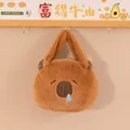 Close-up of a brown Capybara plush bag with fuzzy material hanging from a hook on the wall - 20cm / Snot Bubble Style