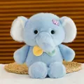 Morbido peluche elefante blu con decorazione a caramella viola e papillon colorato - Elefante Blu Candy / 25cm