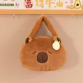 Macro view of the soft brown faux fur material on this cute Capybara plush bag - 20cm / Orange Style