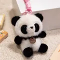 Close-up of a cute plush panda pendant with a leather fashion tag and pink strap - 12cm / Panda