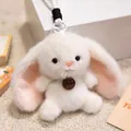 Close-up of a soft white bunny plush pendant with long ears and fashion tag - 12cm / Rabbit