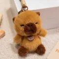 Close-up detail of a soft brown plush animal keychain pendant with a premium leather strap. - 12cm / Capybara Style
