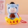 Detail shot of blue plush horse mascot in a yellow gold ingot with red hanging cord - 12cm / Blue