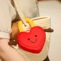 Close-up of a creative red heart-shaped plush lock charm with a cute smile on a bag - Single Piece / 22x5cm