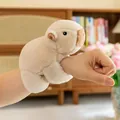 Detail shot of a cute soft plush capybara slap bracelet toy on a person's wrist - Capybara Slap Bracelet / 18cm / Yellow Mink Style