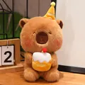 Detailed view of a soft brown capybara plush toy wearing a party hat and holding a cake - Capybara Holding Yellow Cake / 23cm (Without Blush)