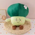 Adorable green broccoli plush toy featuring a small white flower and smiling face - Slanted Eyes Broccoli / 25cm