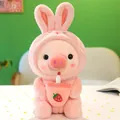 Adorable pink pig plush toy wearing a soft rabbit hoodie holding a strawberry milk tea cup - 25cm / Pink Bunny