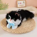 Detailed view of realistic black and white plush cat with blue bow and lace collar - Black (With Sound) / 45cm (Small)