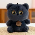 Macro detail of cute dark grey fluffy plush doll featuring embroidered golden eyes. - 16cm / Dark Blue Cat
