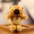 Close-up of a fluffy brown bear plush toy pendant with a fashion tag - Capybara