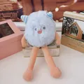 Close-up of a blue long-haired monster plush toy with long legs and striped ears - Blue / 25cm